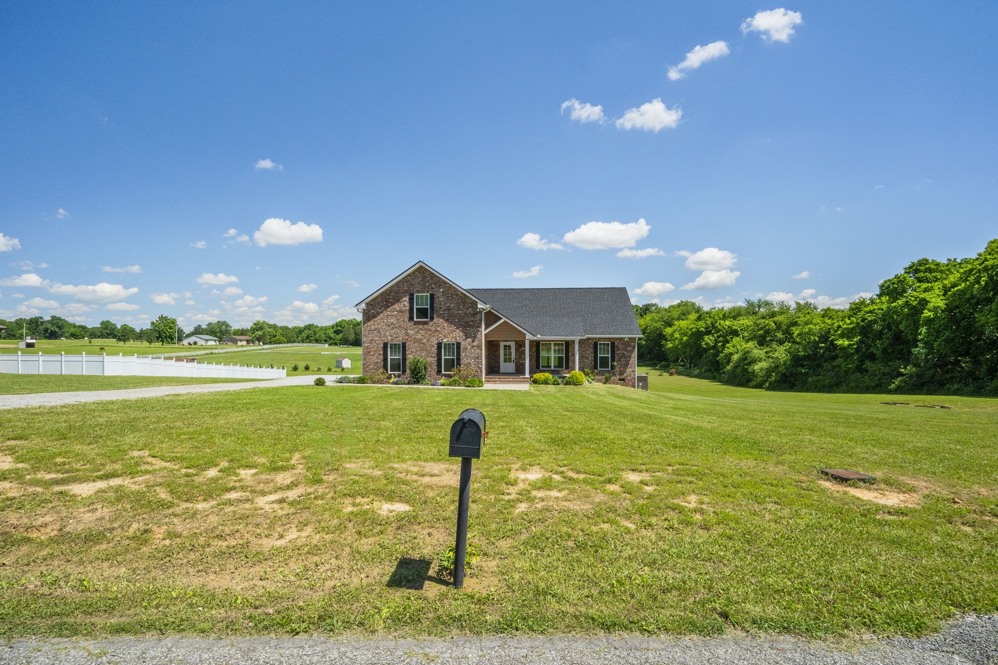 5718 Hoods Branch Road Springfield, TN 37172 - Photo 5 of 47 a front view of a house with a yard