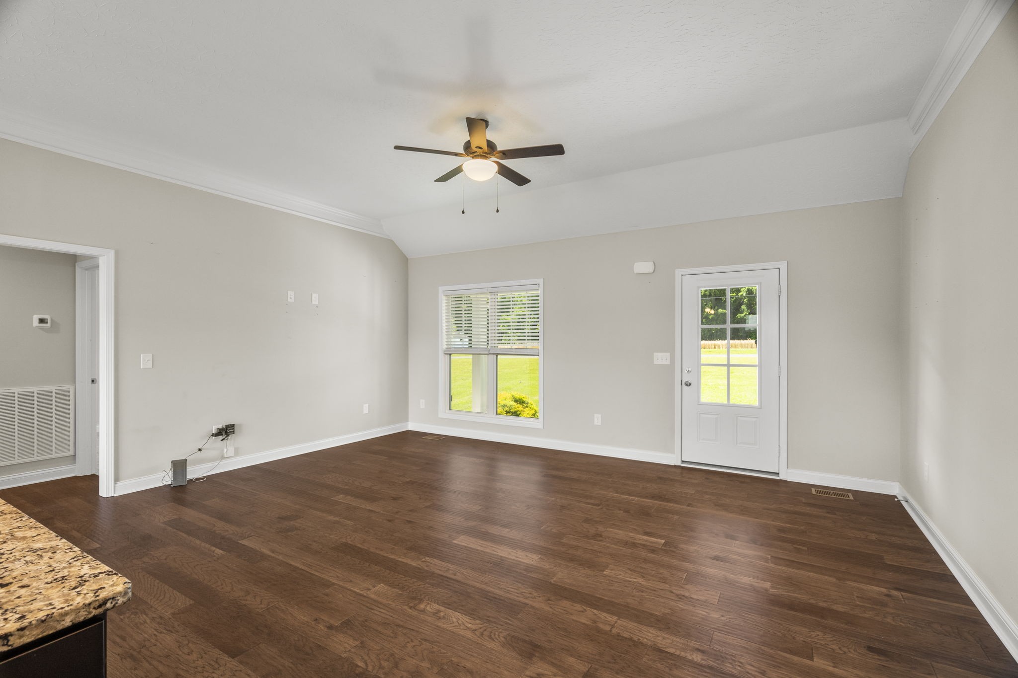 5718 Hoods Branch Road Springfield, TN 37172 - Photo 8 of 47 wooden floor in an empty room with a window