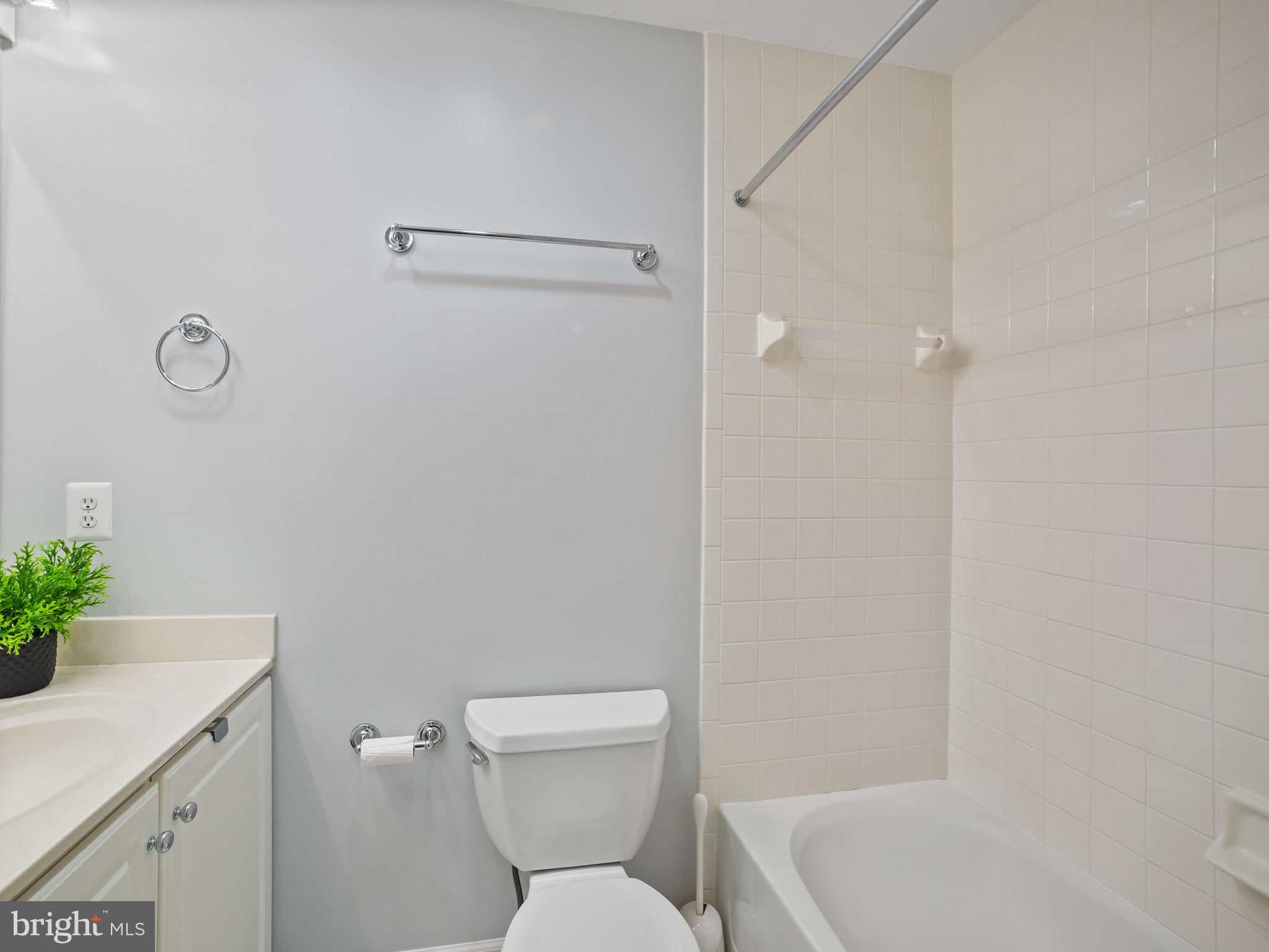 8511 Cameron Street Silver Spring, MD 20910 - Photo 14 of 39 a white toilet sitting next to a white tub