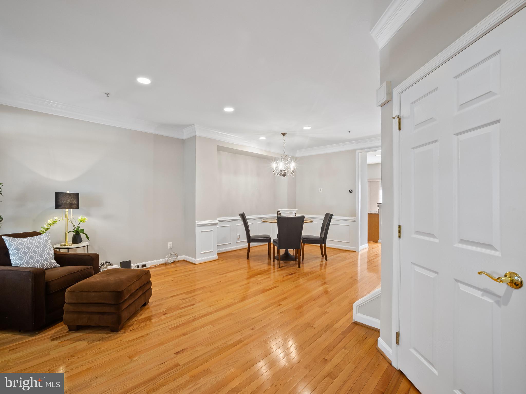8511 Cameron Street Silver Spring, MD 20910 - Photo 2 of 39 a bedroom with furniture and a table