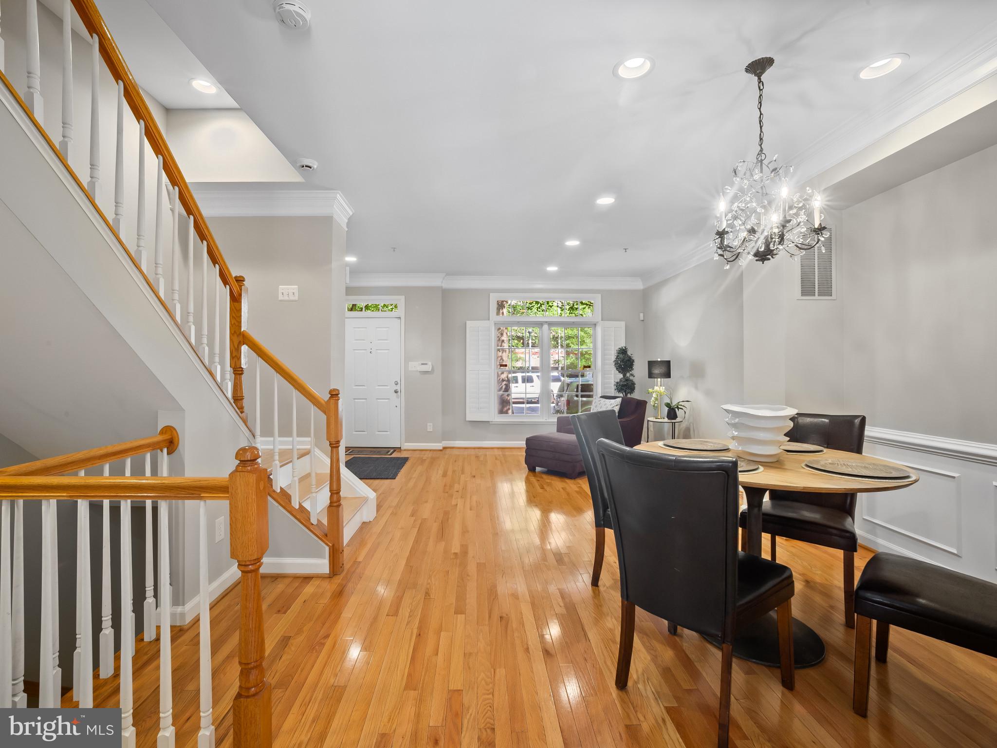 8511 Cameron Street Silver Spring, MD 20910 - Photo 39 of 39 a view of a dining room with furniture and a chandelier