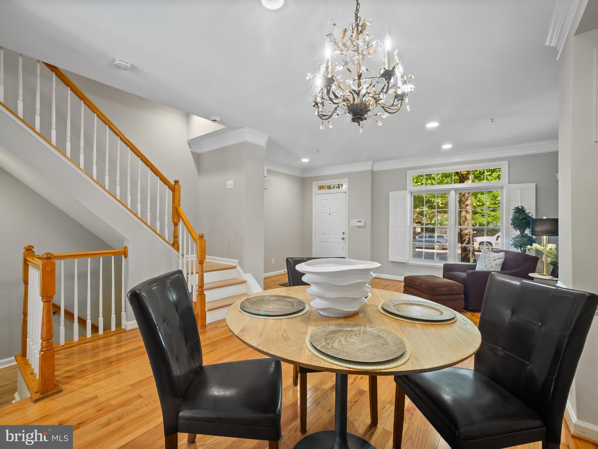 8511 Cameron Street Silver Spring, MD 20910 - Photo 4 of 39 a view of a dining room with furniture window and wooden floor