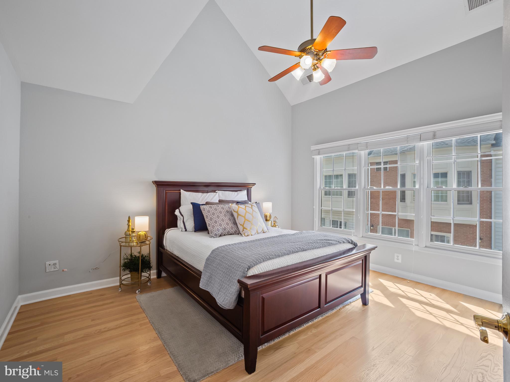 8511 Cameron Street Silver Spring, MD 20910 - Photo 9 of 39 a bedroom with a bed and a large window