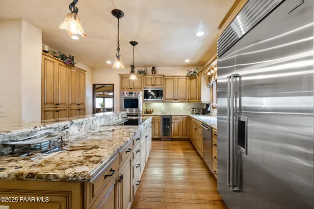 an aerial view of a house with a ocean view