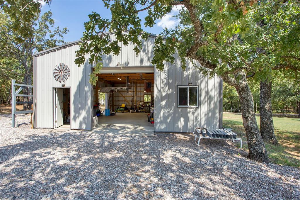 1793 Greer Road Sadler, TX 76264 - Photo 27 of 36 a view of a house with a tree in the yard