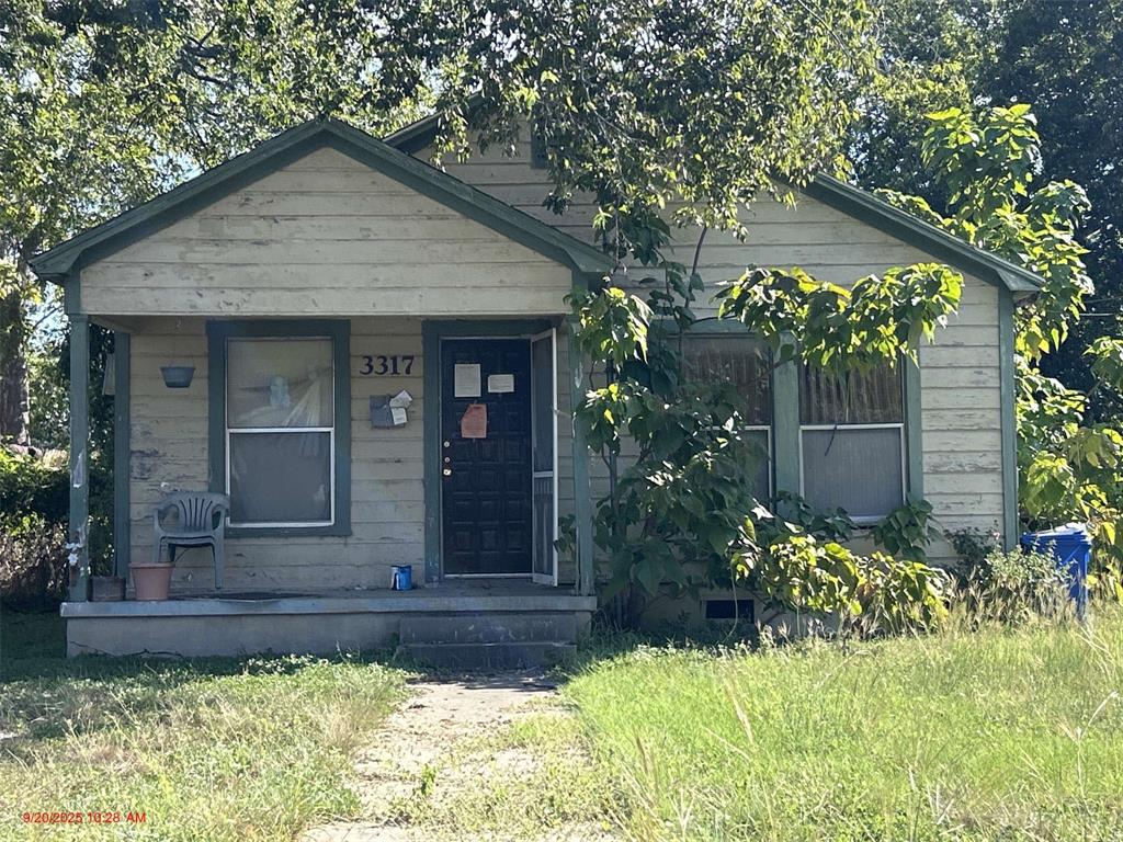 3317 North 23rd Street Waco, TX 76708 - Photo 1 of 22 front view of a house with a yard