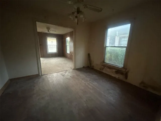 an empty room with windows