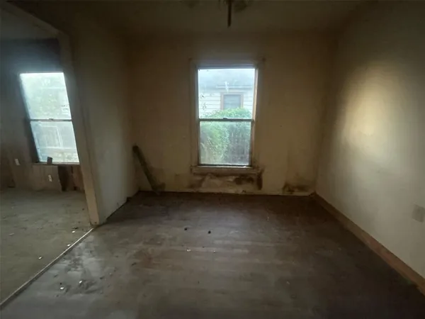 a living room with furniture and a gate