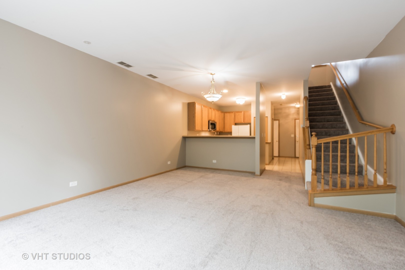 1207 Brookdale Drive Carpentersville, IL 60110 - Photo 4 of 14 a view of a livingroom with an empty space