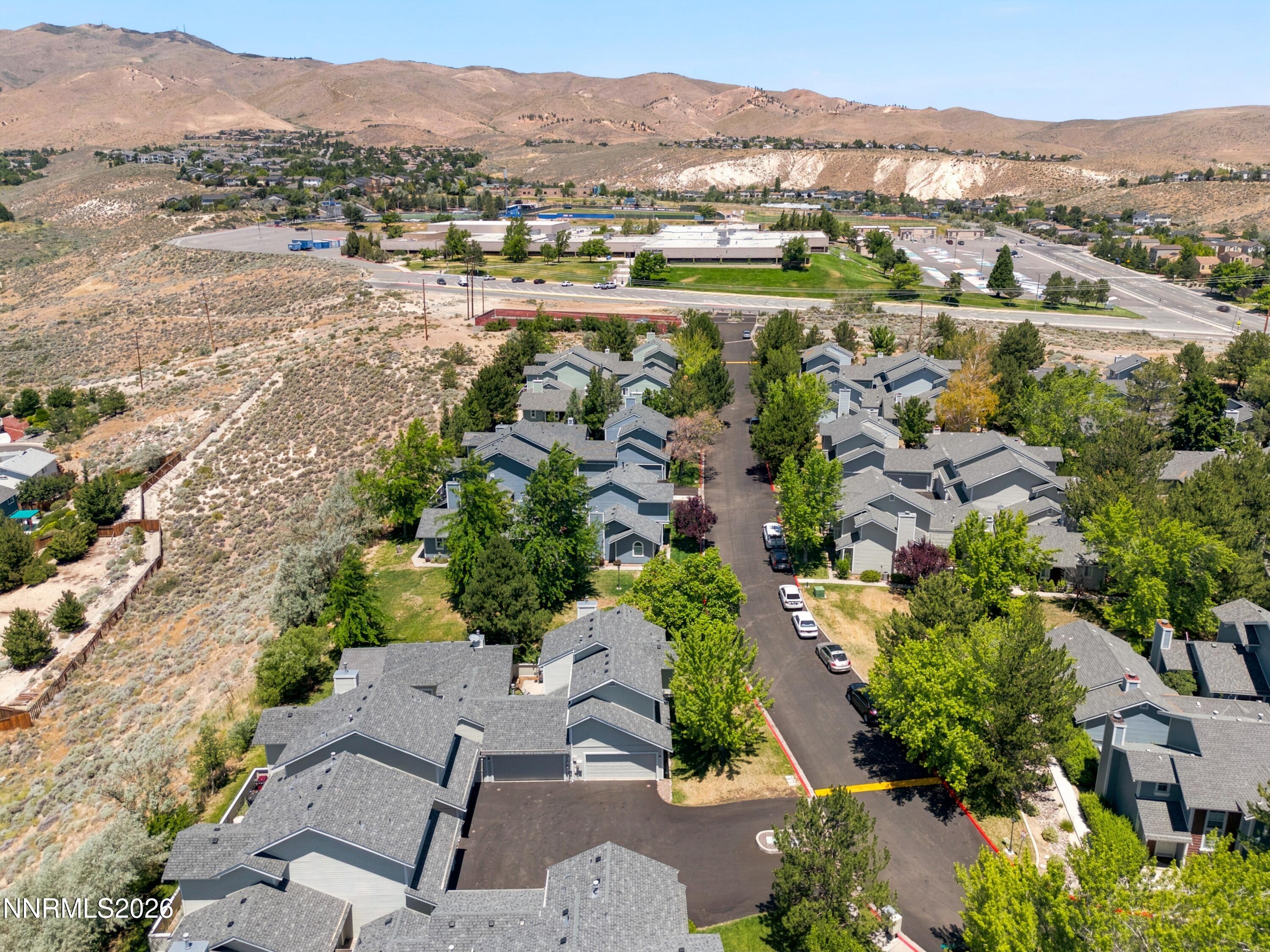1899 Tuolumne Drive Reno, NV 89523 - Photo 34 of 44 an aerial view of residential houses with outdoor space and river