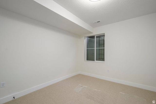 250 South Main Street, Unit 25 Alpine, UT 84004 - Photo 28 of 31 Spare room with baseboards and carpet floors