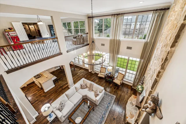 a bathroom with a granite countertop toilet a sink and a mirror