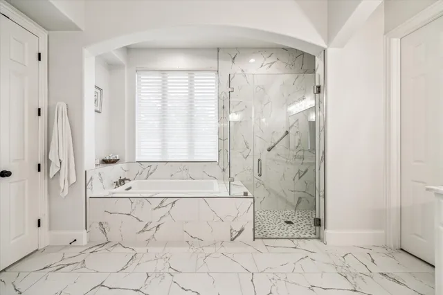 a bathroom with a granite countertop sink mirror and