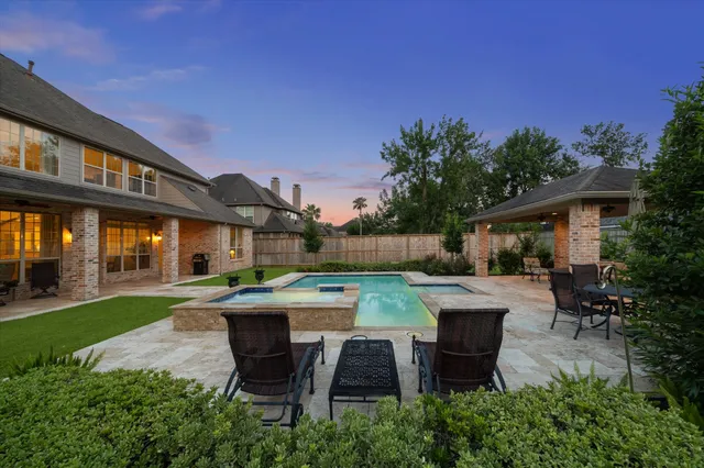 a front view of a house with swimming pool