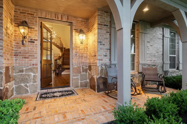 a view of entryway with wooden floor and stairs