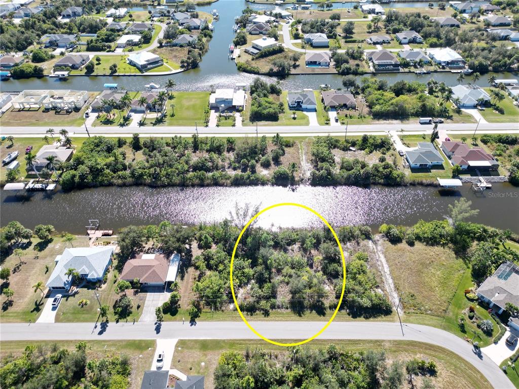15706 Stuart Circle Port Charlotte, FL 33981 - Photo 6 of 10 an aerial view of a house with a lake view