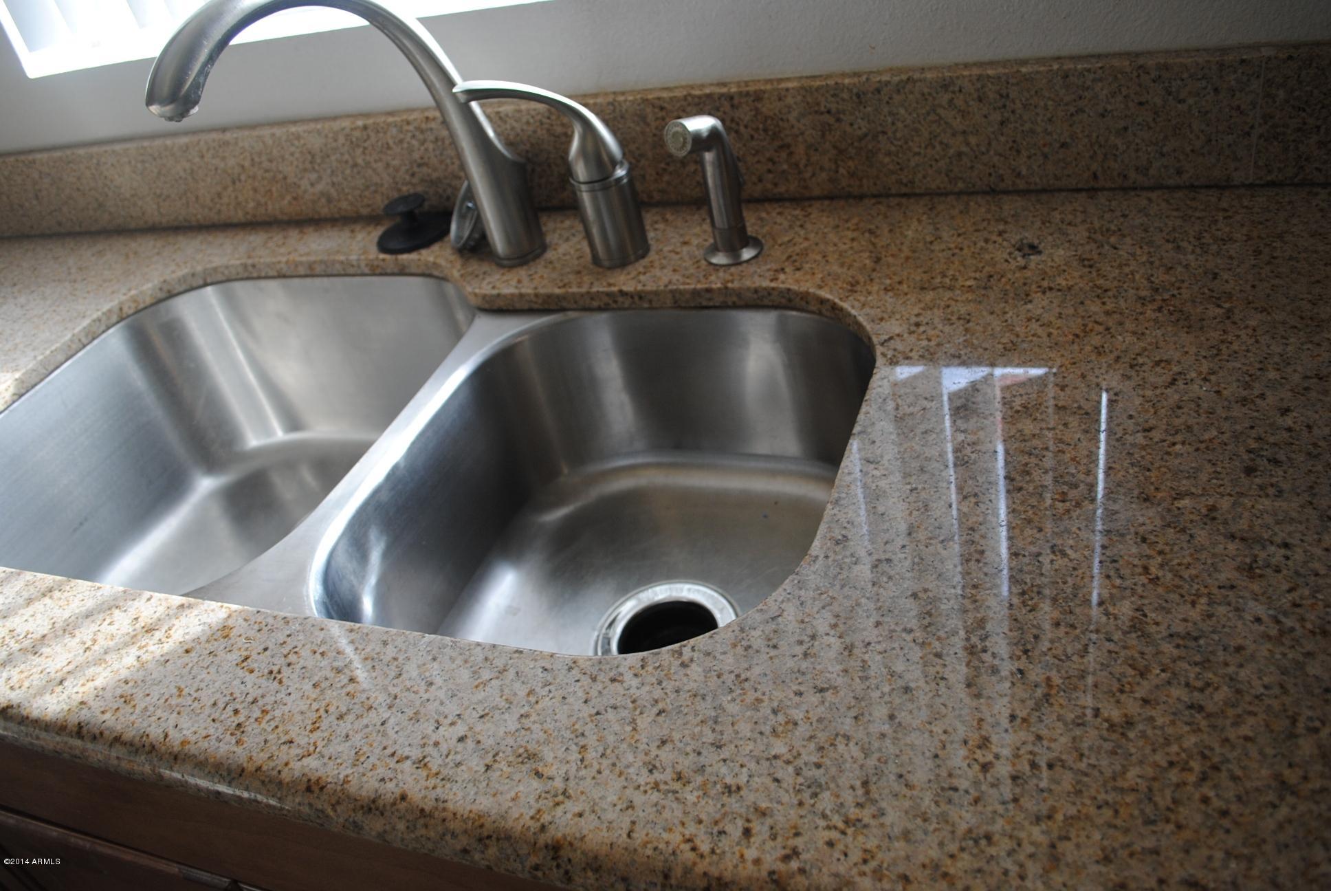 2923 East Cactus Road Phoenix, AZ 85032 - Photo 8 of 24 Granite countertop with s/s sink
