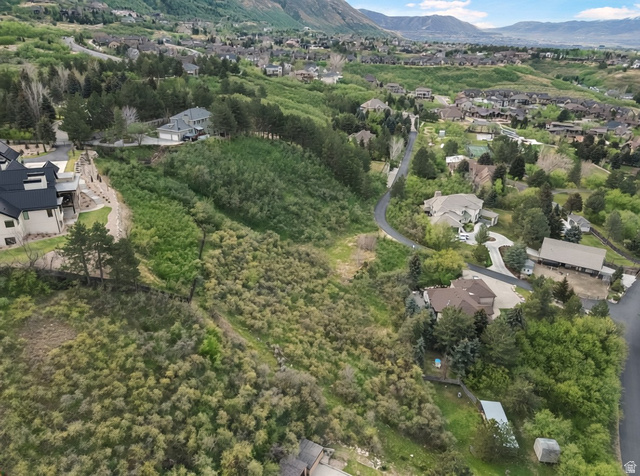 10667 Hidden Ridge Lane Sandy, UT 84092 - Photo 8 of 21 Aerial perspective of suburban area featuring a mountainous background