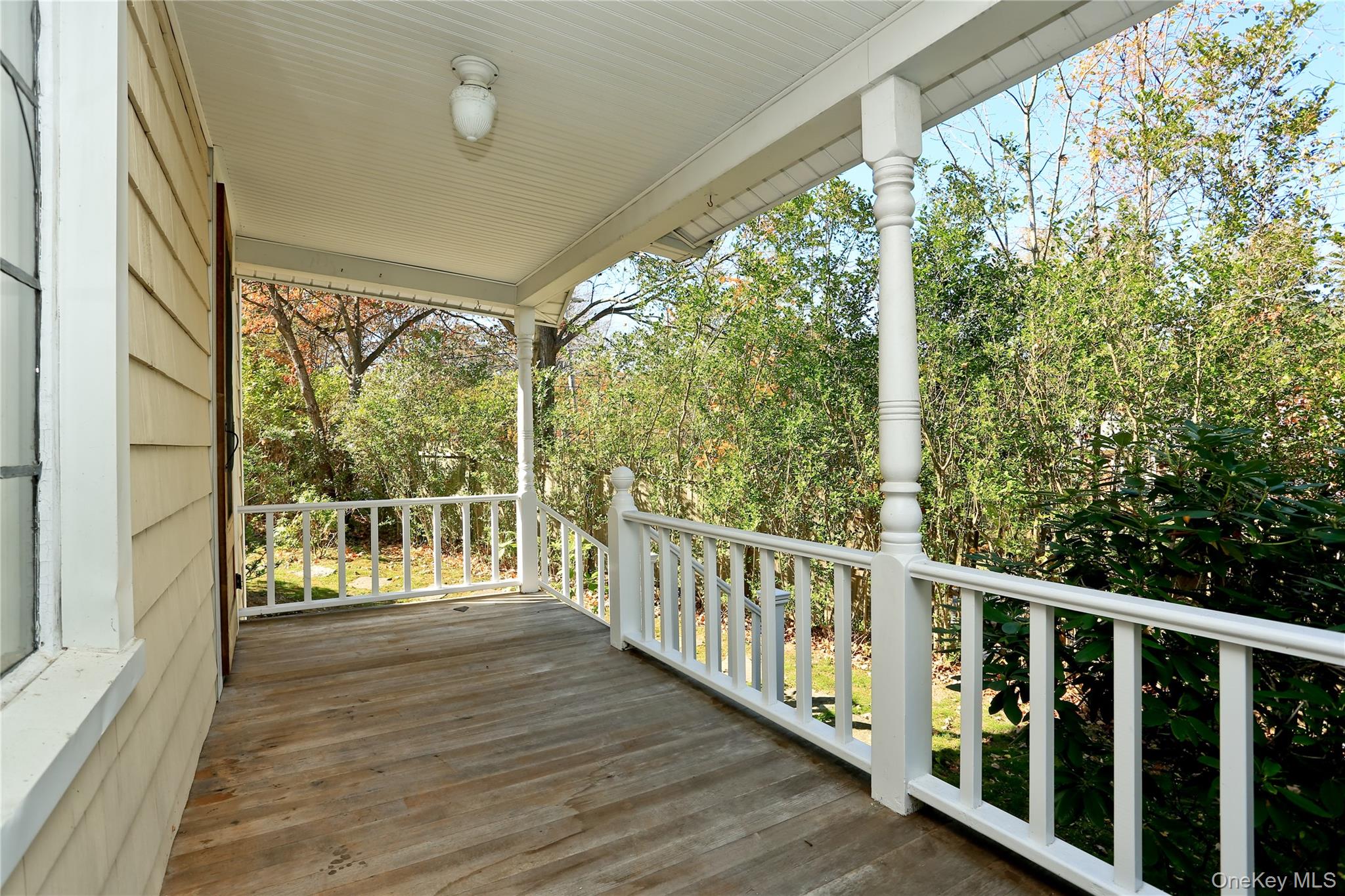 277 Old Post Road Bedford, NY 10506 - Photo 2 of 39 a view of a balcony with wooden floor