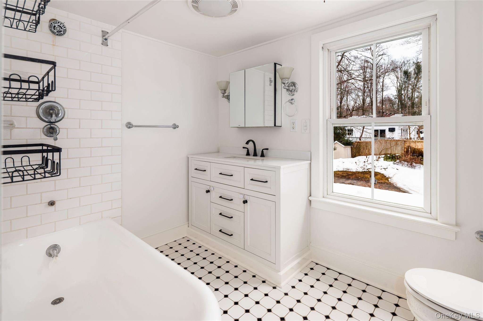 277 Old Post Road Bedford, NY 10506 - Photo 30 of 39 a bathroom with a bathtub sink and mirror