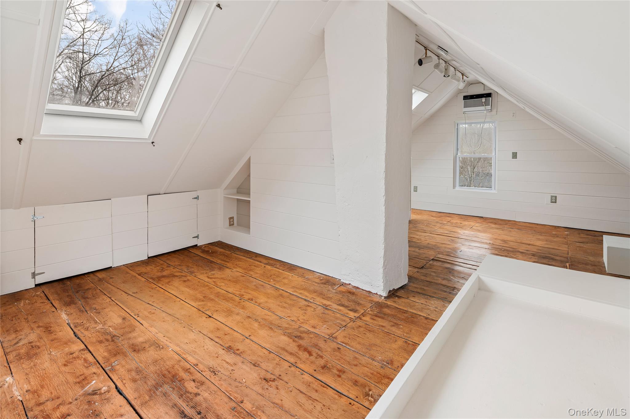 277 Old Post Road Bedford, NY 10506 - Photo 37 of 39 a view of empty room with wooden floor