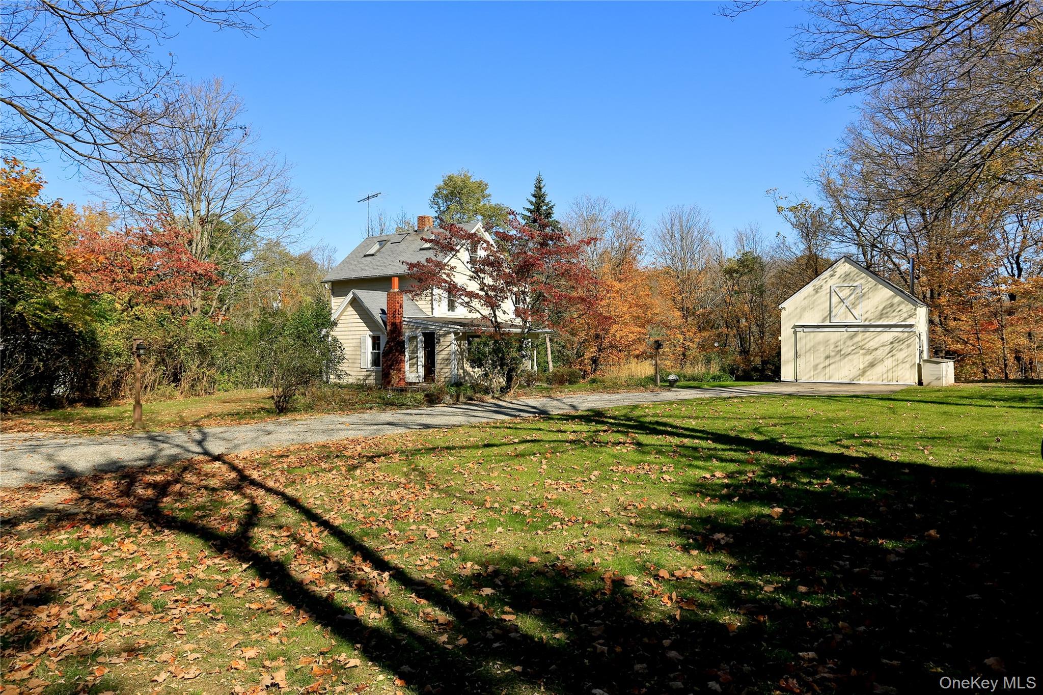 277 Old Post Road Bedford, NY 10506 - Photo 38 of 39 a view of a house with a yard