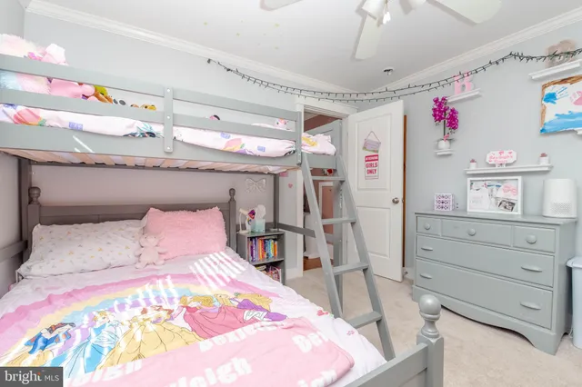 a bathroom with a sink a mirror and a shower