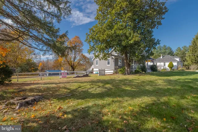 a view of a playground with green space