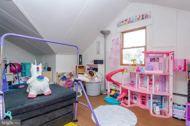 a view of a house with outdoor seating