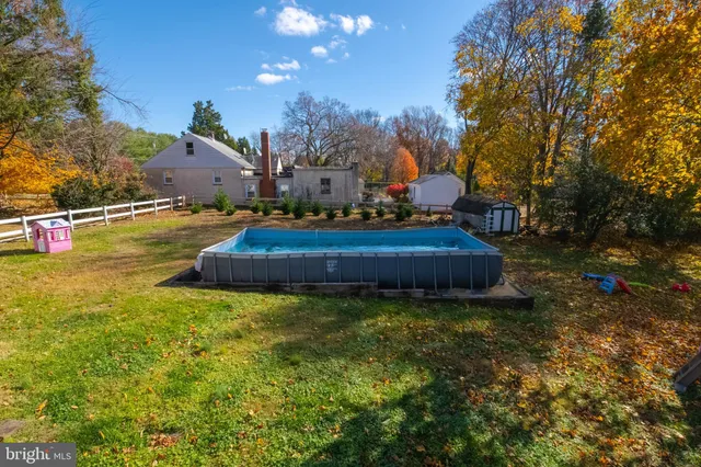 a fire hydrant in the middle of a field