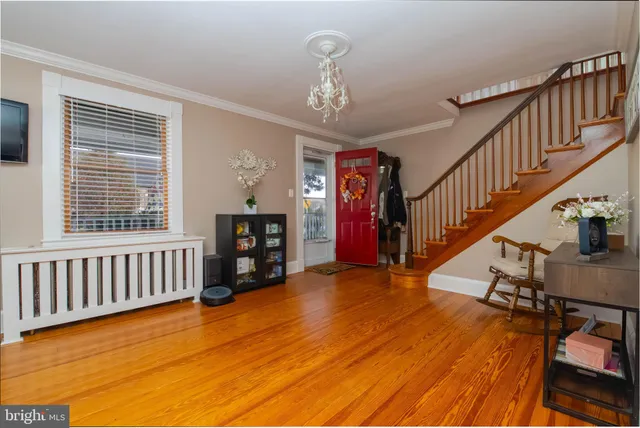 a kitchen with a sink stove top oven and cabinets