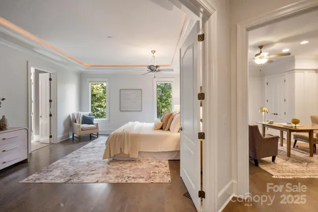 a bedroom with furniture and a window