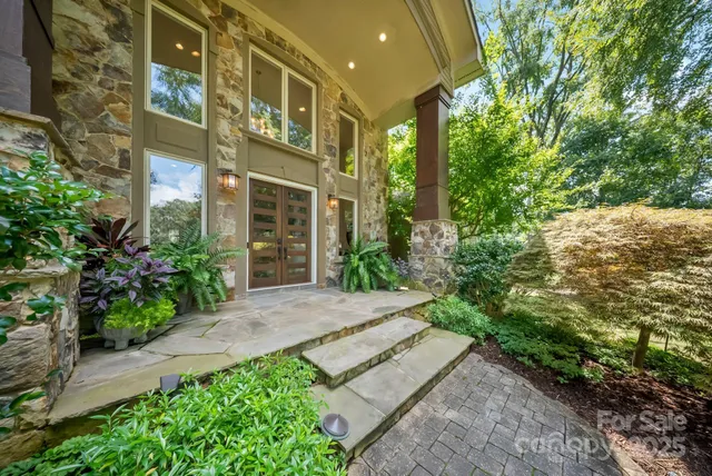 a view of a brick building next to a yard