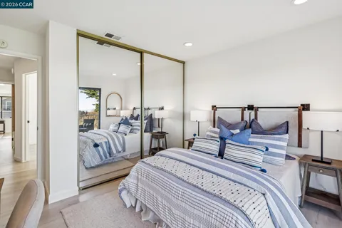 a view of a balcony with chairs and a table