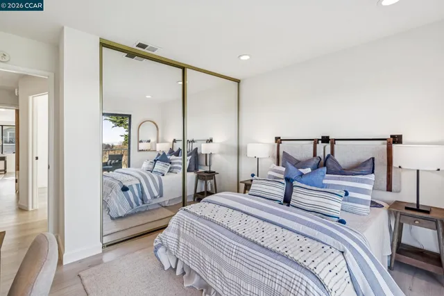 a view of a balcony with chairs and a table