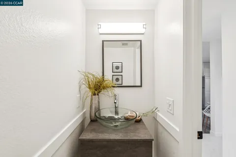 a view of chairs and table in patio