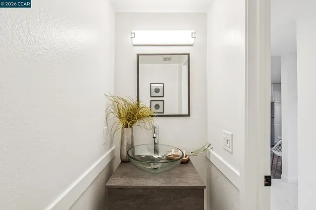 a view of chairs and table in patio