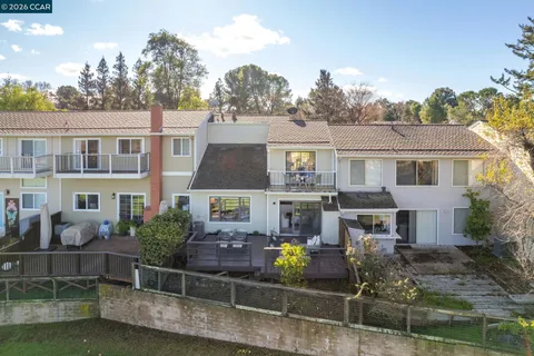 an aerial view of a house with lake view