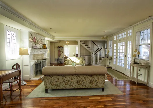 a living room with a couch and a table