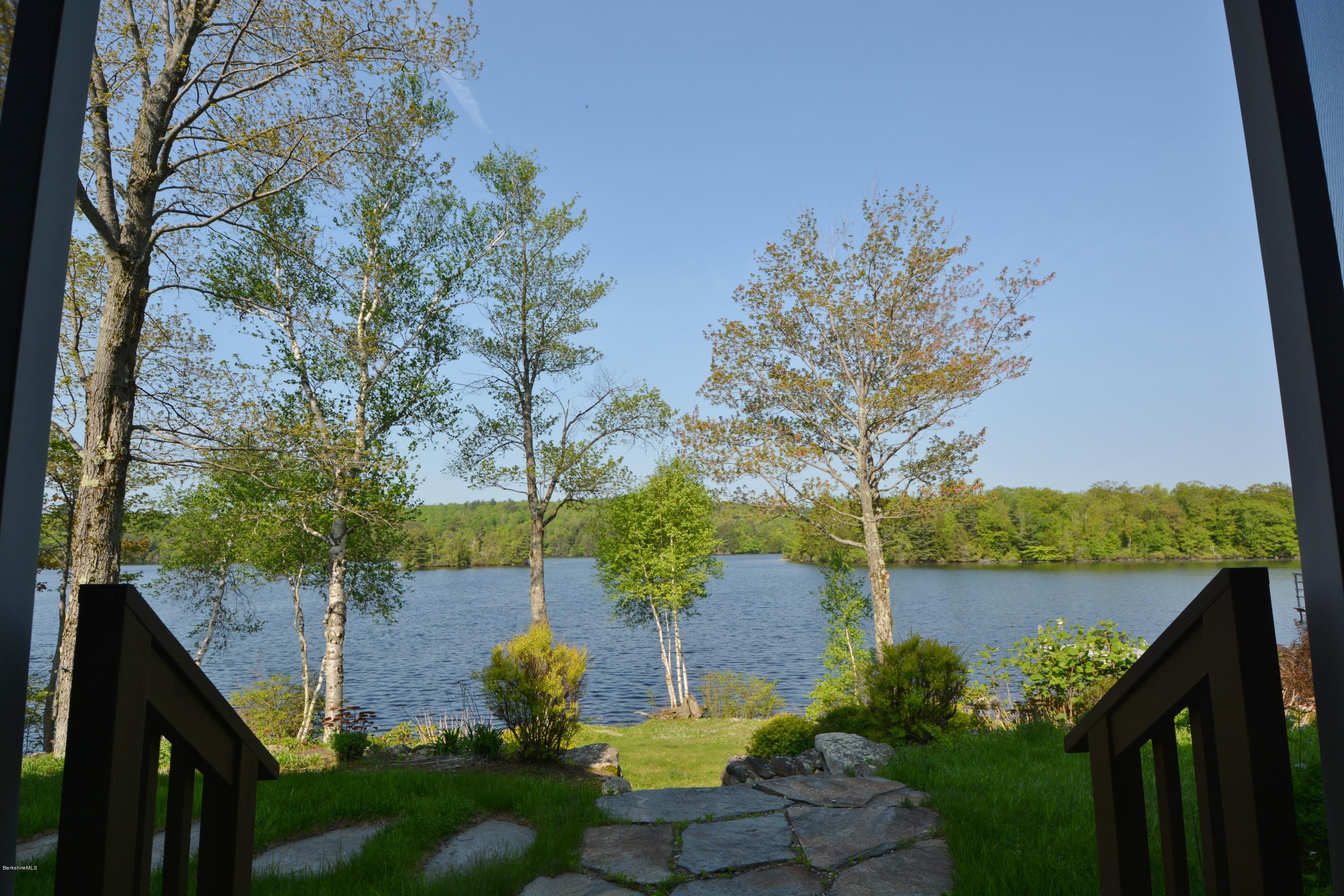 54 Ona Road Tolland, MA 01034 - Photo 1 of 5 a view of a garden with sitting area