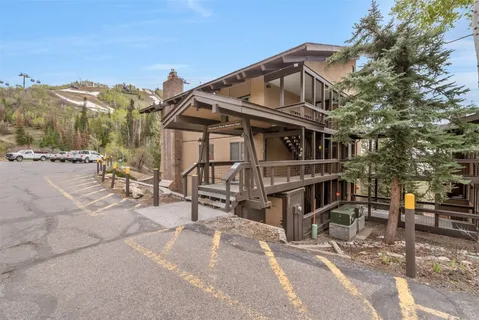 a view of a street with a building in the background