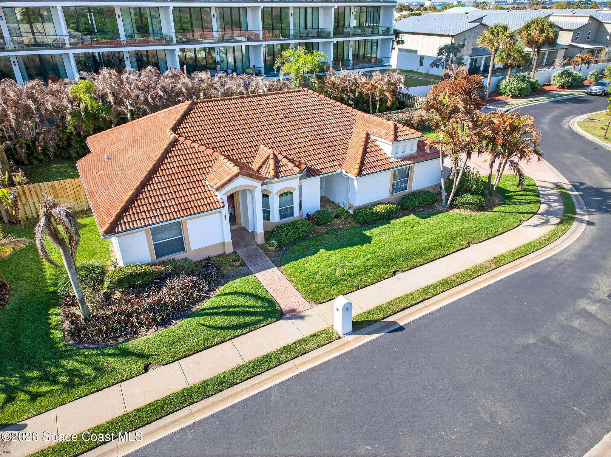 121 Ocean Ridge Drive Melbourne Beach, FL 32951 - Photo 1 of 41 a aerial view of a house with yard and plants