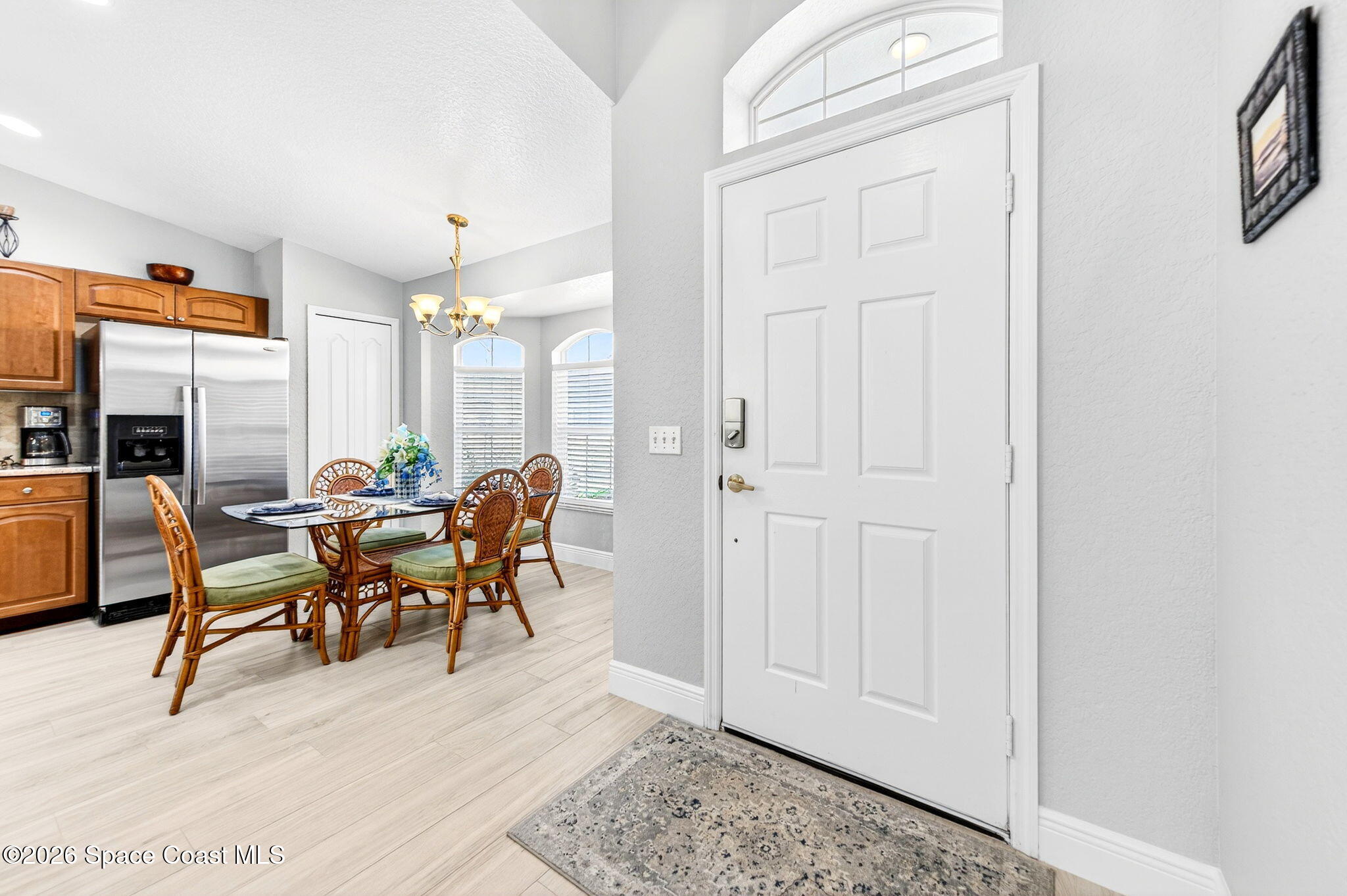 121 Ocean Ridge Drive Melbourne Beach, FL 32951 - Photo 25 of 41 a view of a dining room with furniture