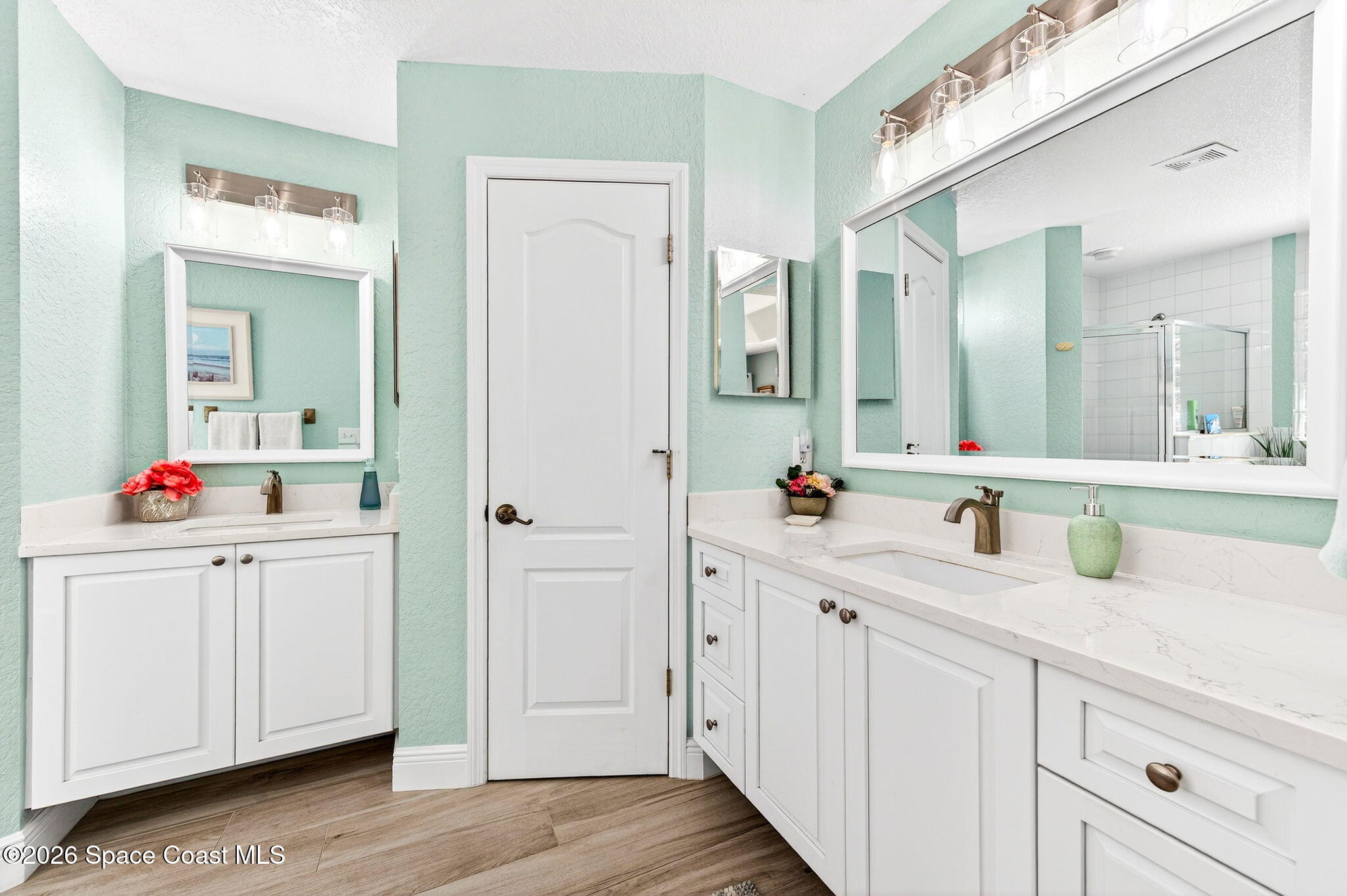 121 Ocean Ridge Drive Melbourne Beach, FL 32951 - Photo 33 of 41 a bathroom with a sink and a mirror