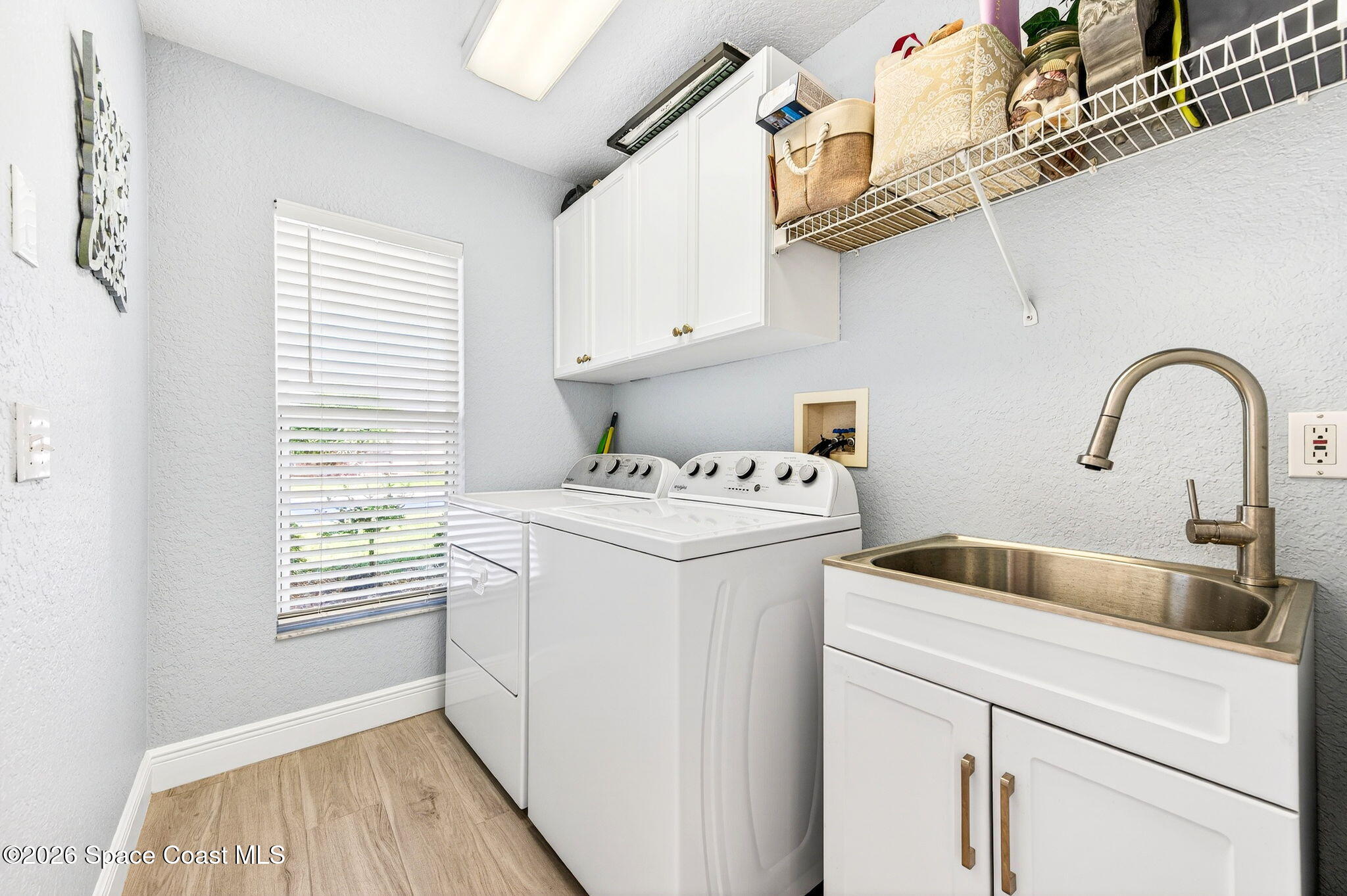 121 Ocean Ridge Drive Melbourne Beach, FL 32951 - Photo 40 of 41 a utility room with dryer and washer