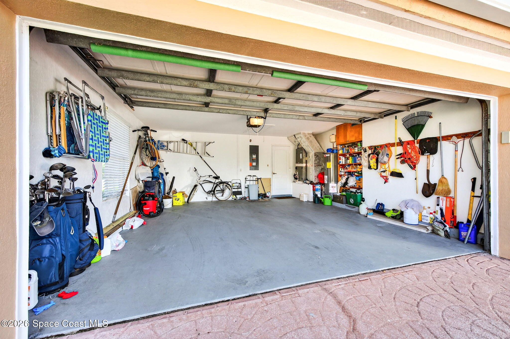 121 Ocean Ridge Drive Melbourne Beach, FL 32951 - Photo 41 of 41 a view of a garage with rack and bicycle
