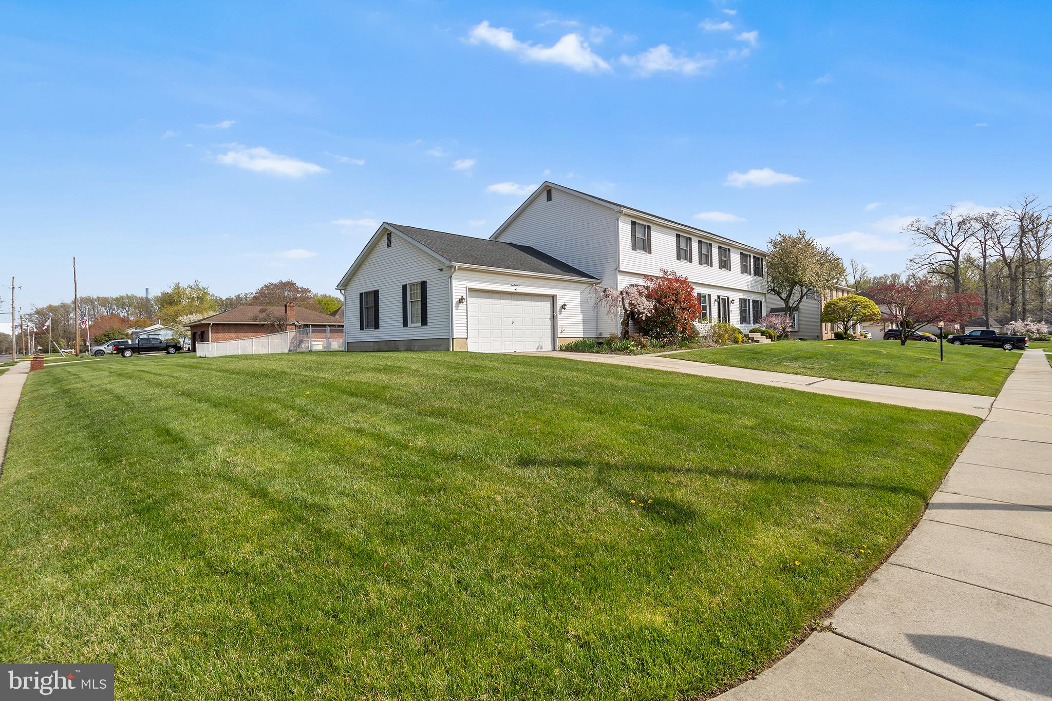 200 Casperson Street Gibbstown, NJ 08027 - Photo 3 of 64 a view of a house with a big yard and large trees