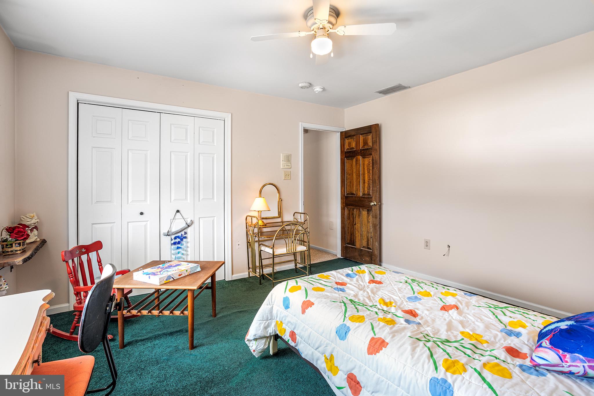 200 Casperson Street Gibbstown, NJ 08027 - Photo 33 of 64 a bedroom with bed and a chandelier