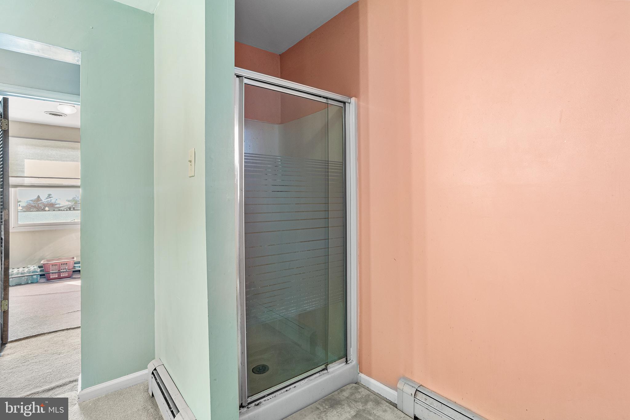 200 Casperson Street Gibbstown, NJ 08027 - Photo 39 of 64 a bathroom with a glass shower door