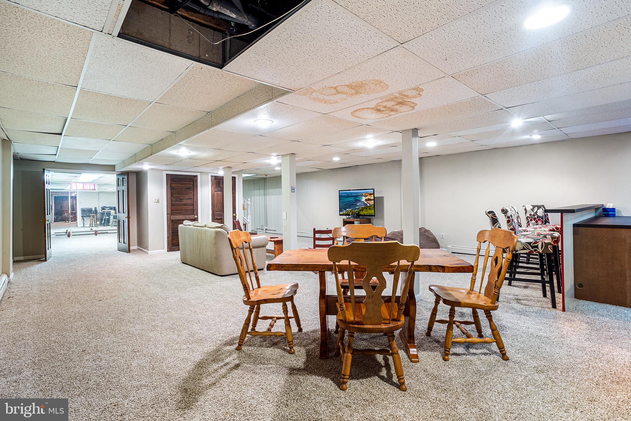 200 Casperson Street Gibbstown, NJ 08027 - Photo 43 of 64 a view of a dining room with furniture and a potted plant